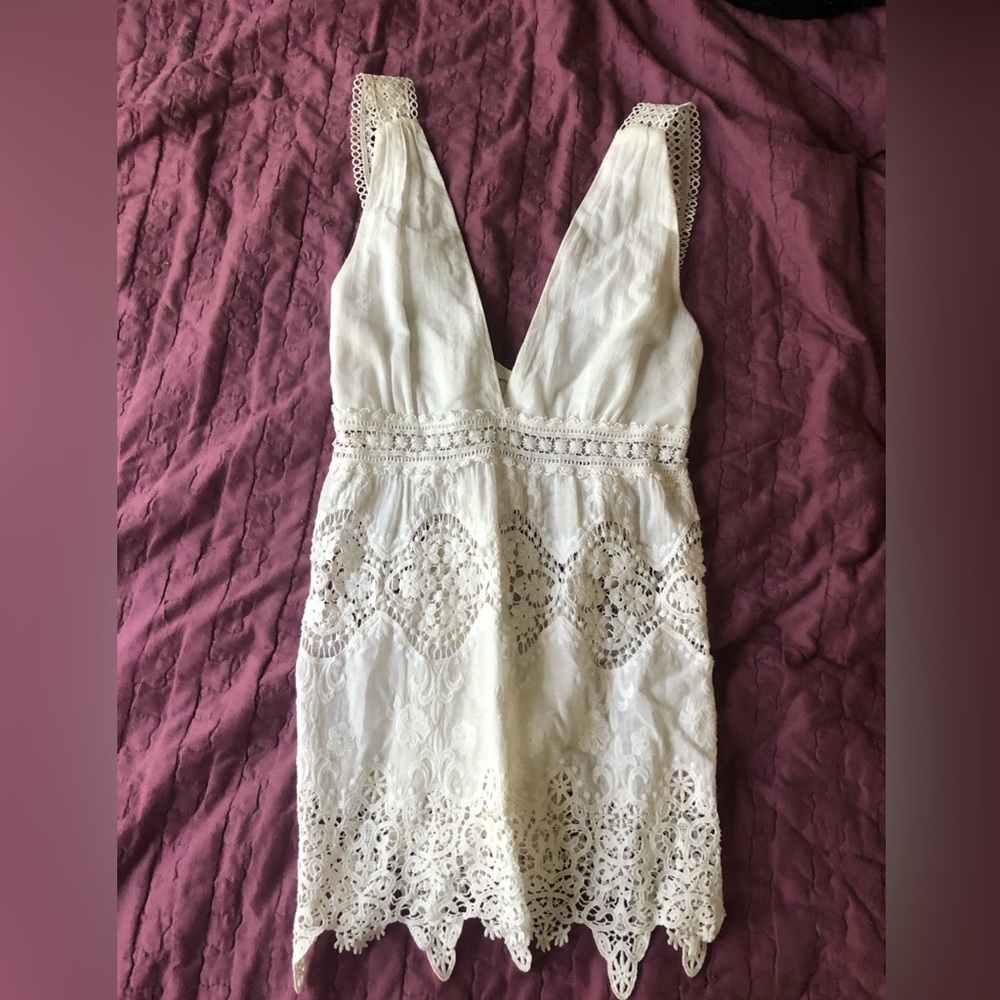 Lace summer top with plunging neck and lacey detail